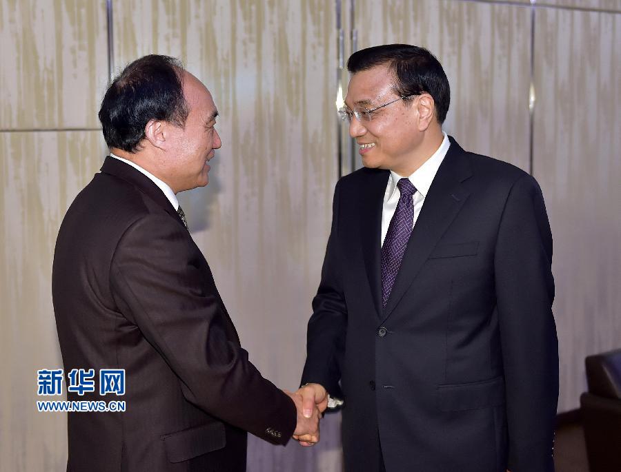 1月22日，中國國務院總理李克強在瑞士蘇黎世會見國際電信聯(lián)盟秘書長趙厚麟。 新華社記者 李濤 攝 
