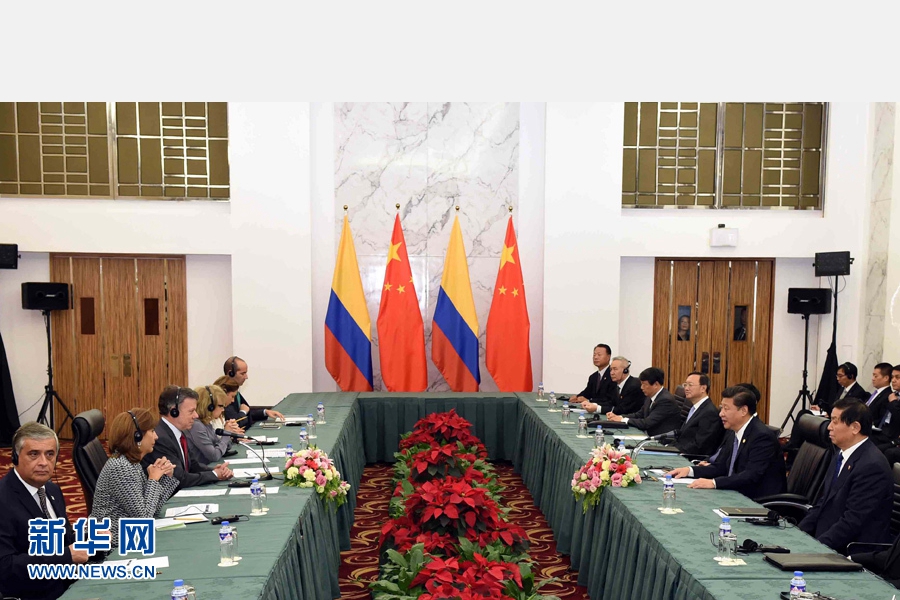 11月18日，國(guó)家主席習(xí)近平在菲律賓馬尼拉會(huì)見哥倫比亞總統(tǒng)桑托斯。 新華社記者 饒愛民 攝
