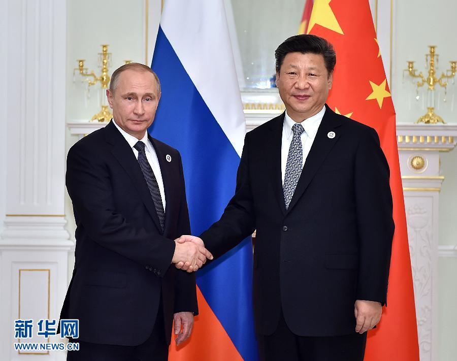 6月23日，國家主席習(xí)近平在烏茲別克斯坦塔什干會見俄羅斯總統(tǒng)普京。新華社記者李濤攝