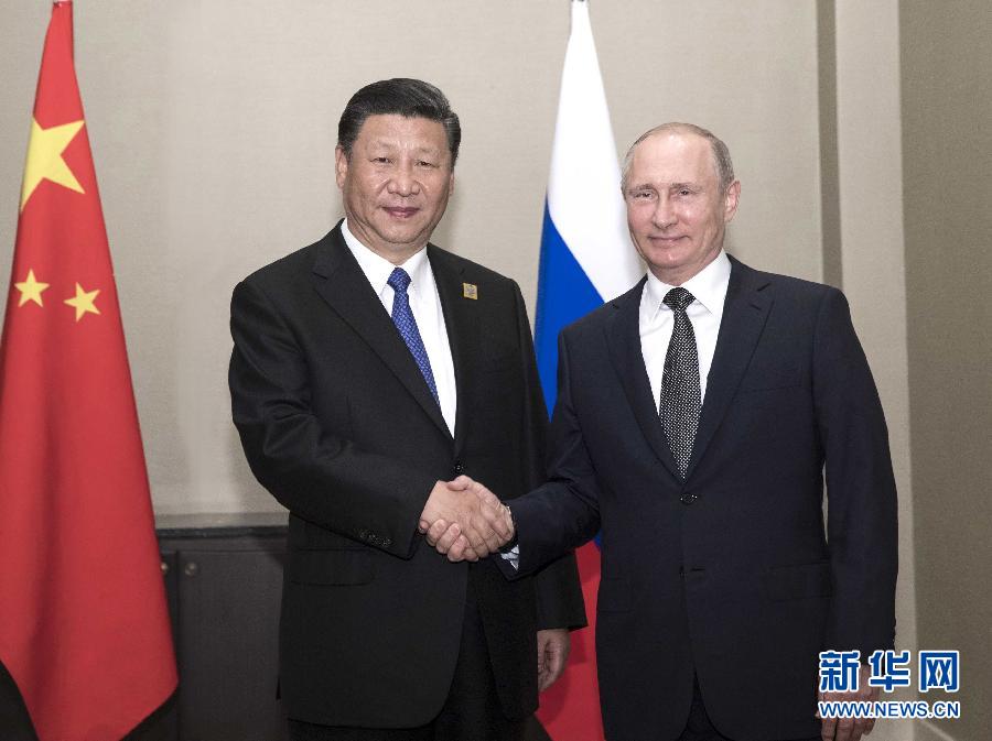 6月8日，國(guó)家主席習(xí)近平在阿斯塔納會(huì)見(jiàn)俄羅斯總統(tǒng)普京。 新華社記者蘭紅光 攝
